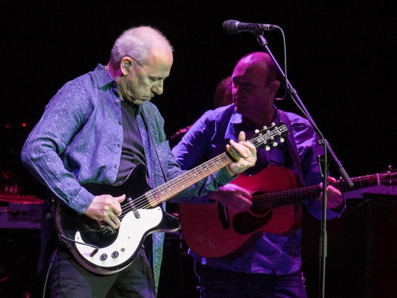 Two Musicians on Stage — Purple, Focused