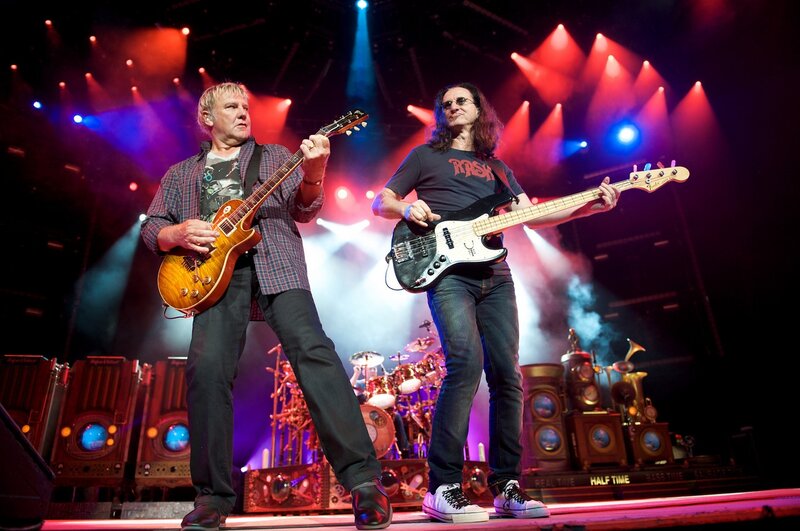 Two Musicians on Stage — Red, Energetic, Night