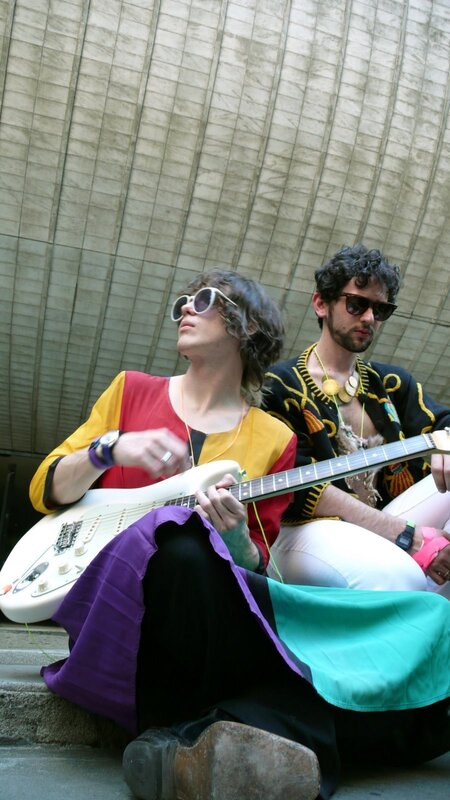Two musicians on steps