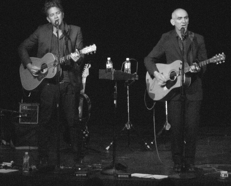 Two musicians performing on stage