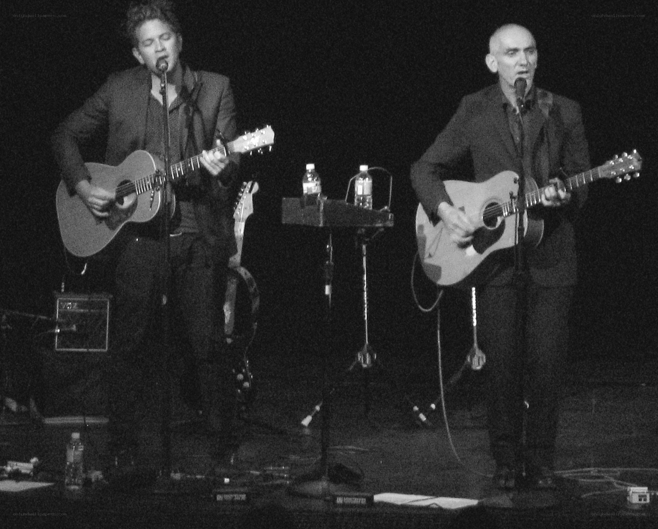 Two musicians performing on stage