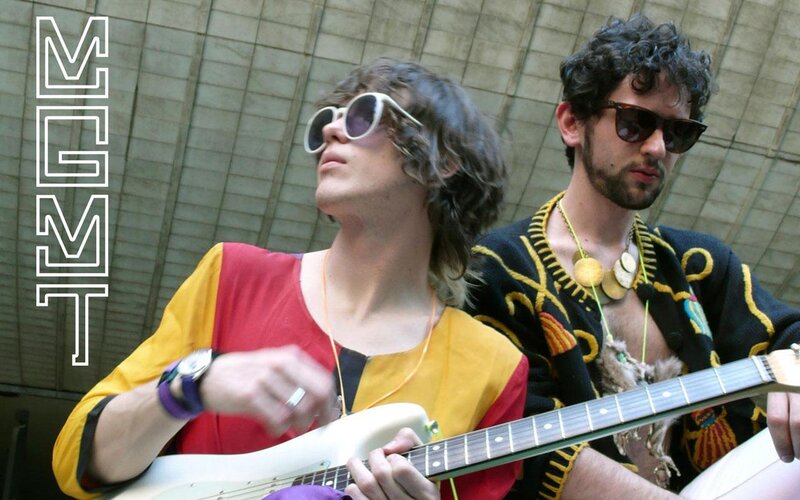 two musicians playing guitar