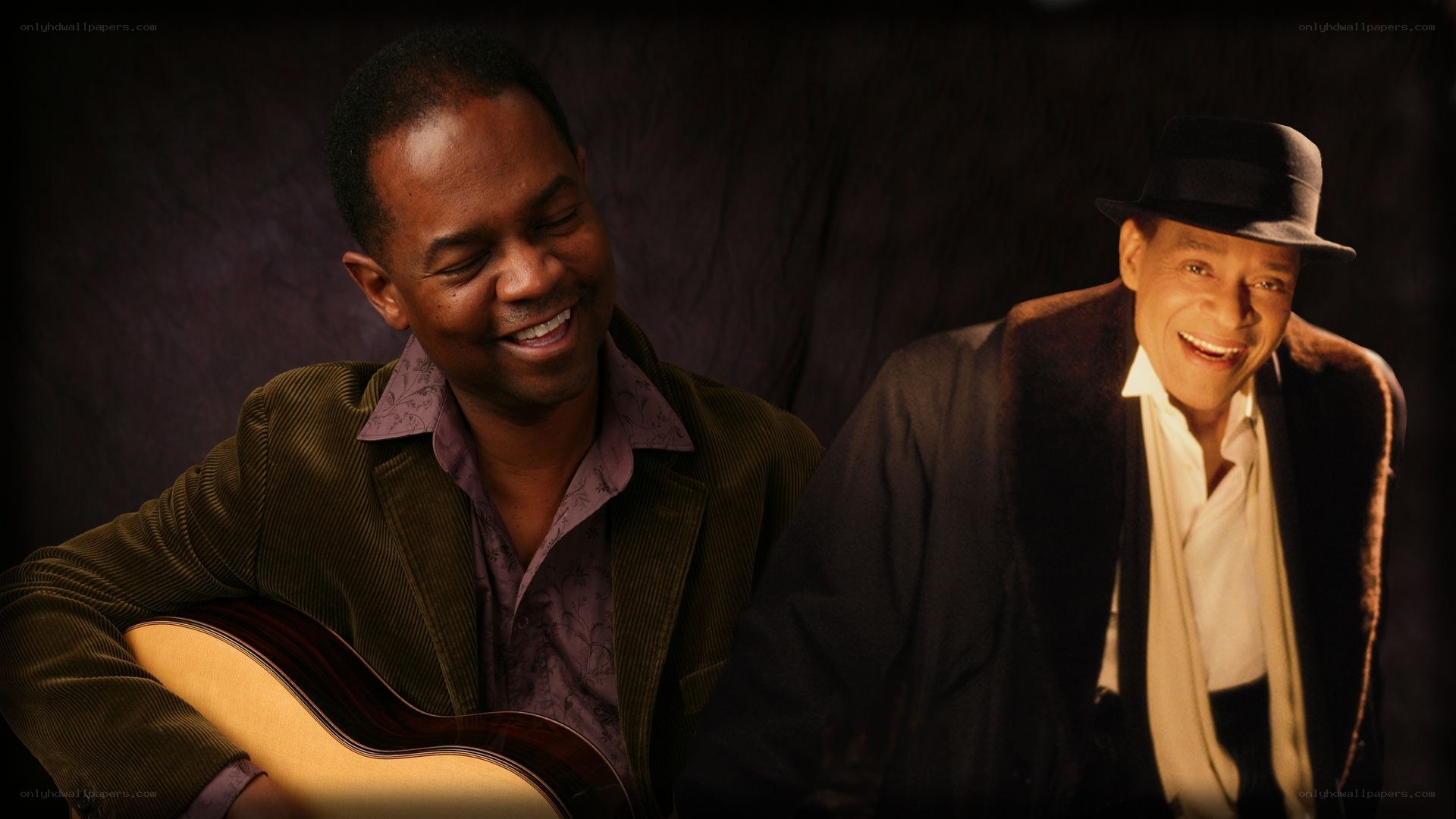 Two musicians smiling together