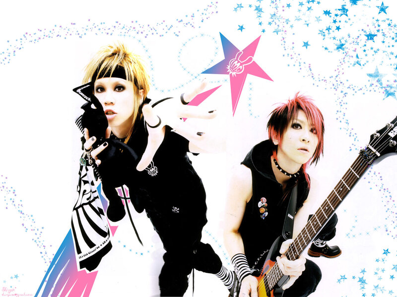 two musicians with colorful hair