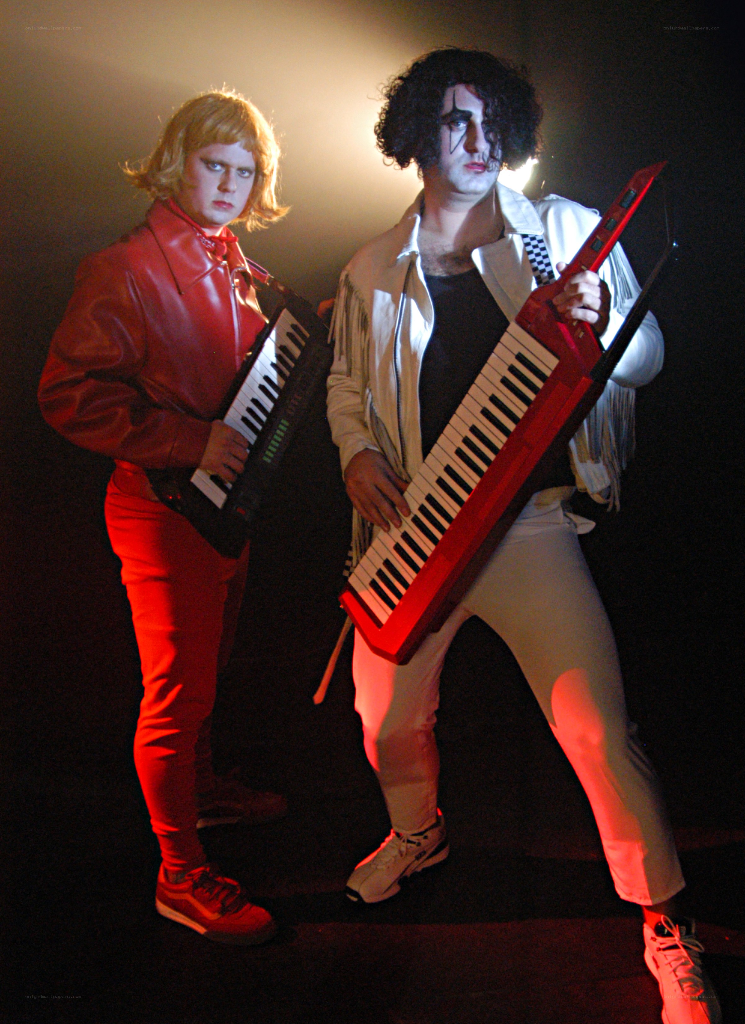 Two musicians with keytars