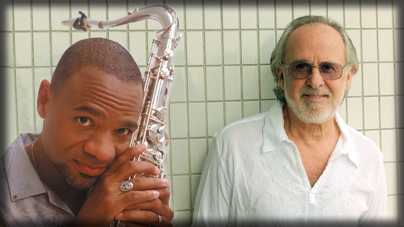 Two musicians with saxophone