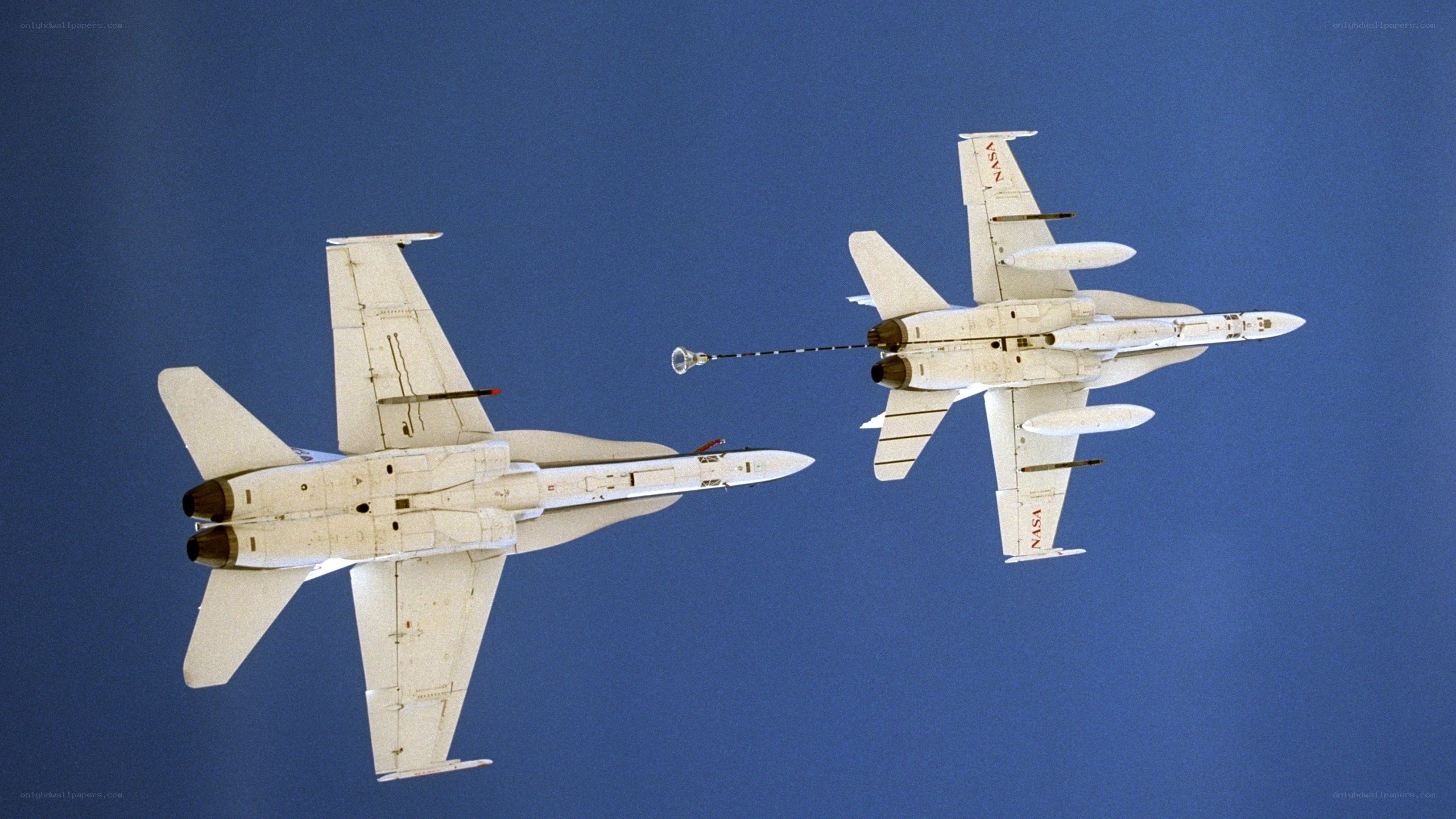 Two NASA jets in flight