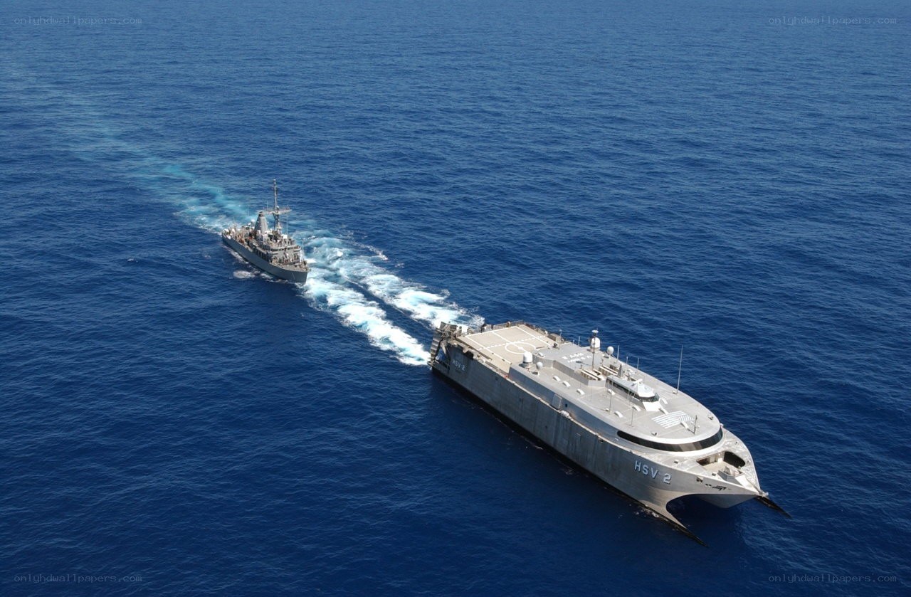 Two naval ships at sea