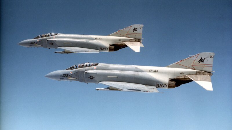 Two Navy F-4 Phantom II jets in flight