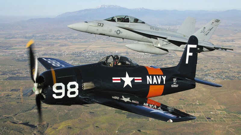 Two Navy planes in flight