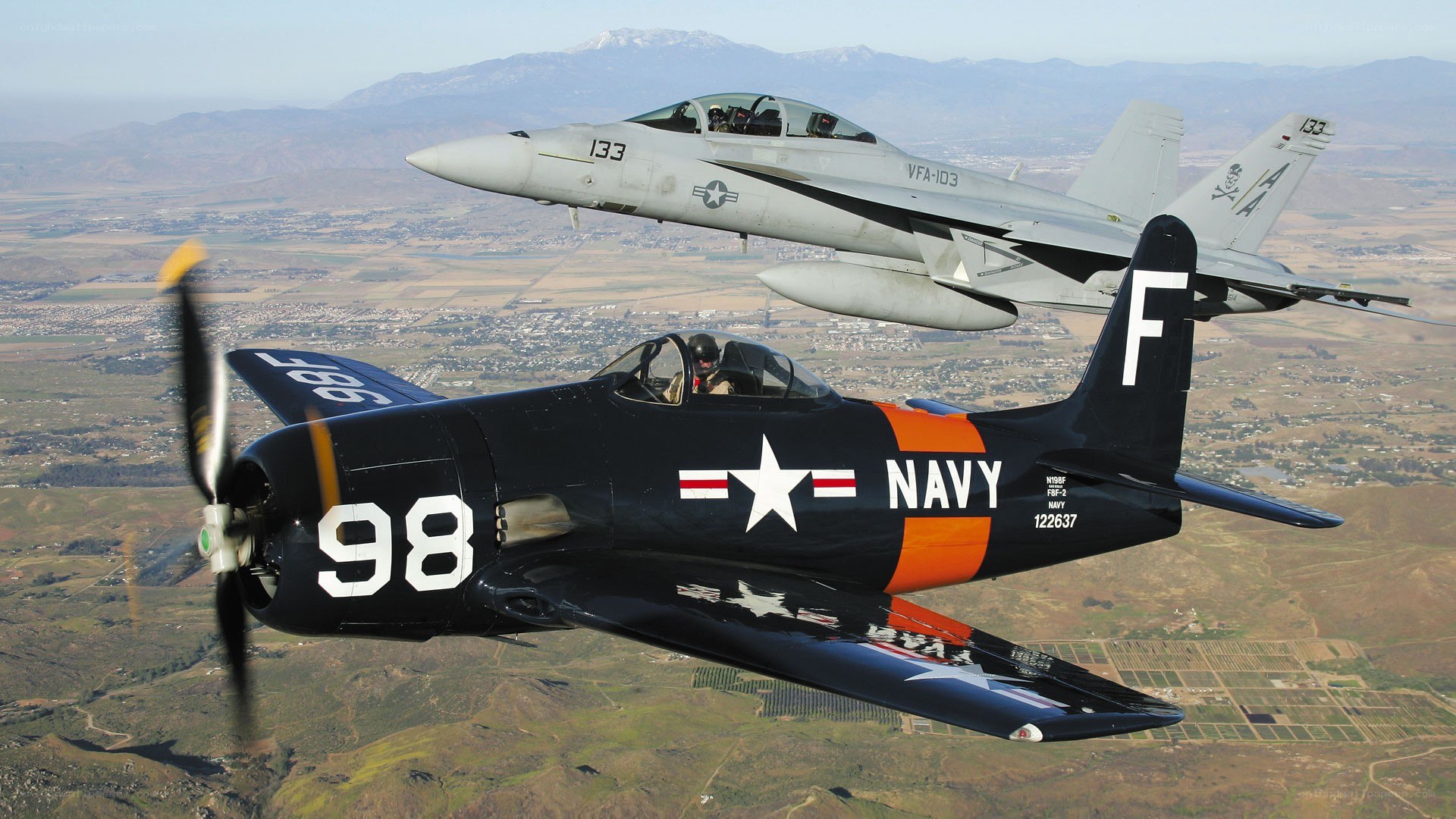 Two Navy planes in flight