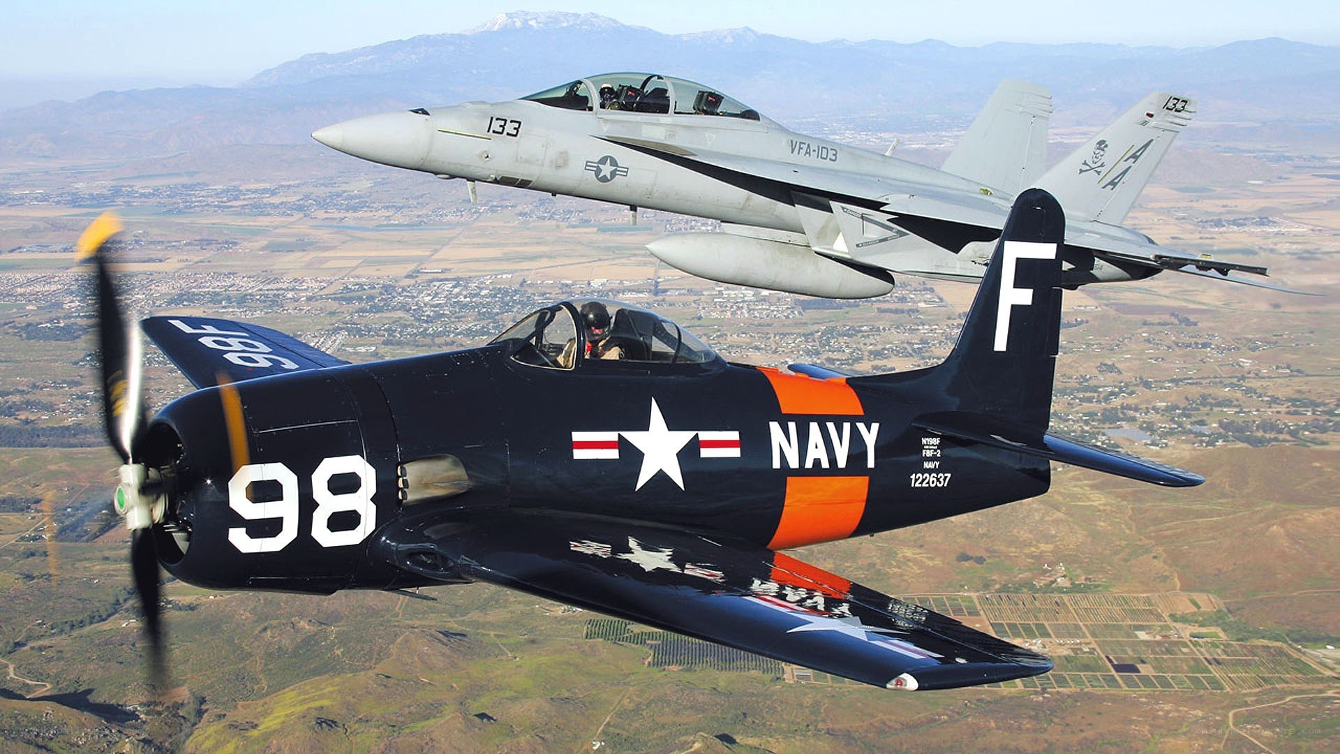 Two Navy planes in flight