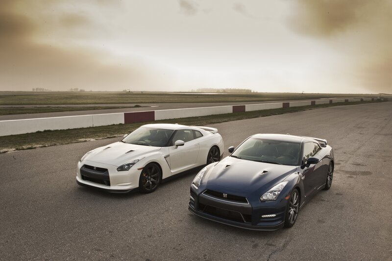 Two Nissan GT-Rs on a racetrack