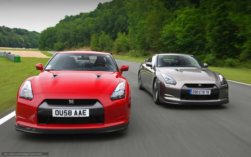 Two Nissan GT-Rs on a track
