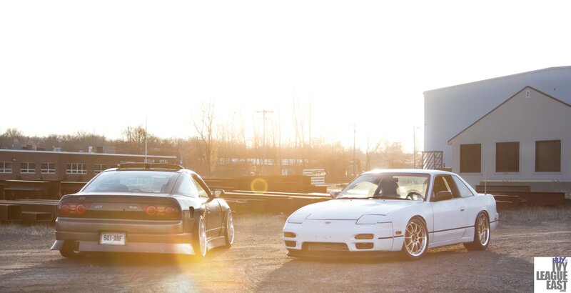 Two Nissan Silvia cars at sunset