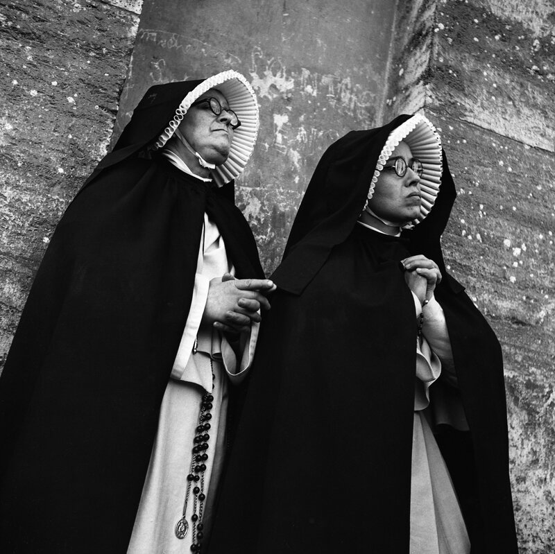 Two nuns in prayer