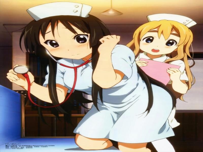 Two Nurses in Uniform