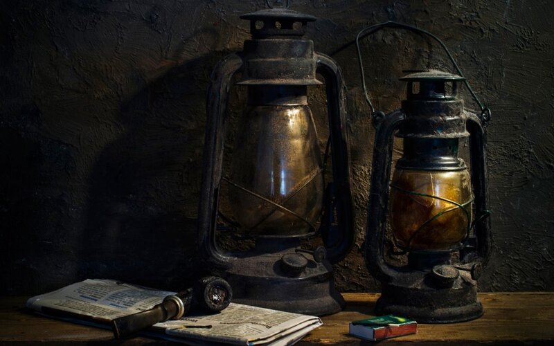 Two Oil Lamps on Table