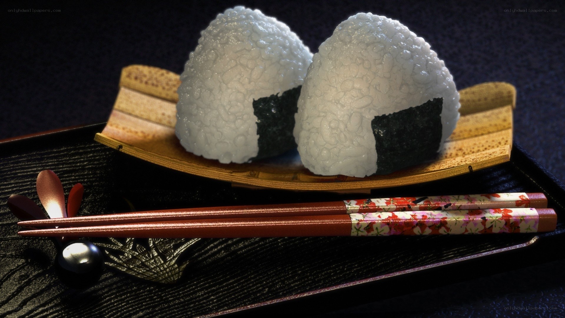 Two onigiri on a tray