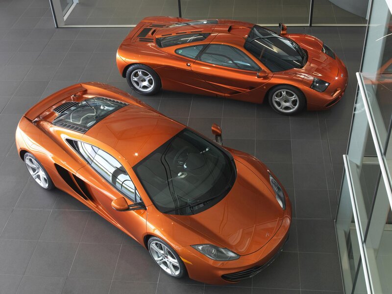 Two orange McLaren supercars