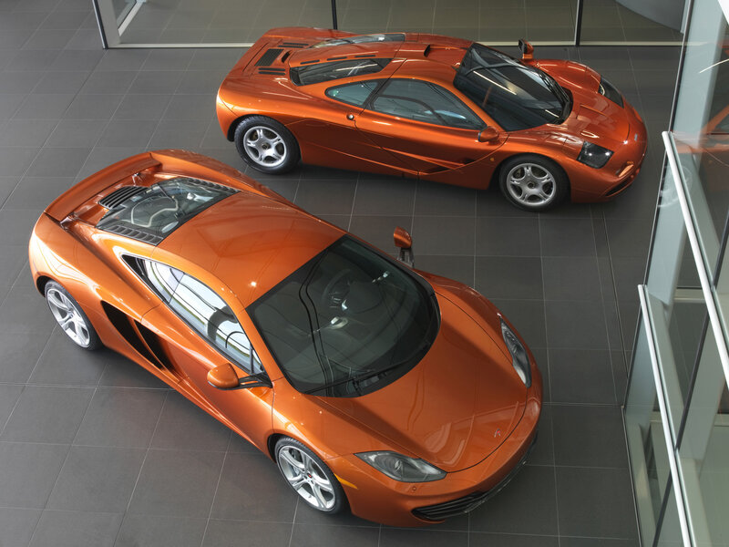 Two orange McLaren supercars