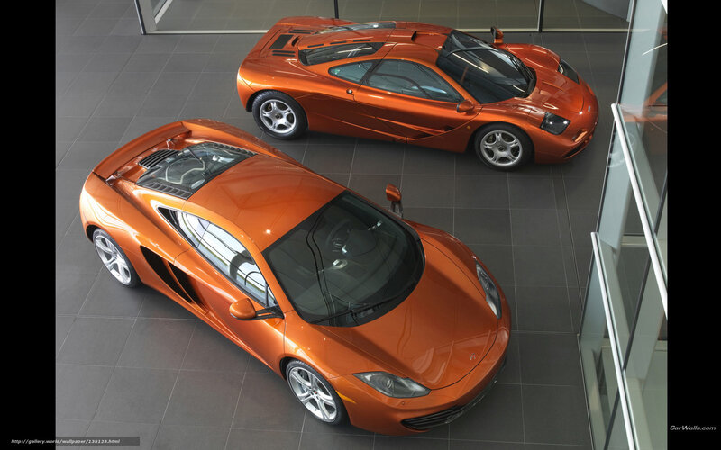 Two orange McLaren supercars