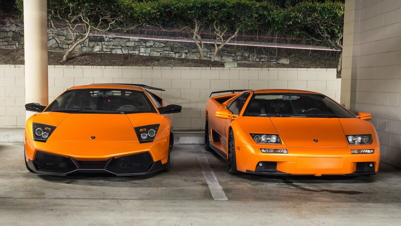Two Orange Sports Cars — Calm