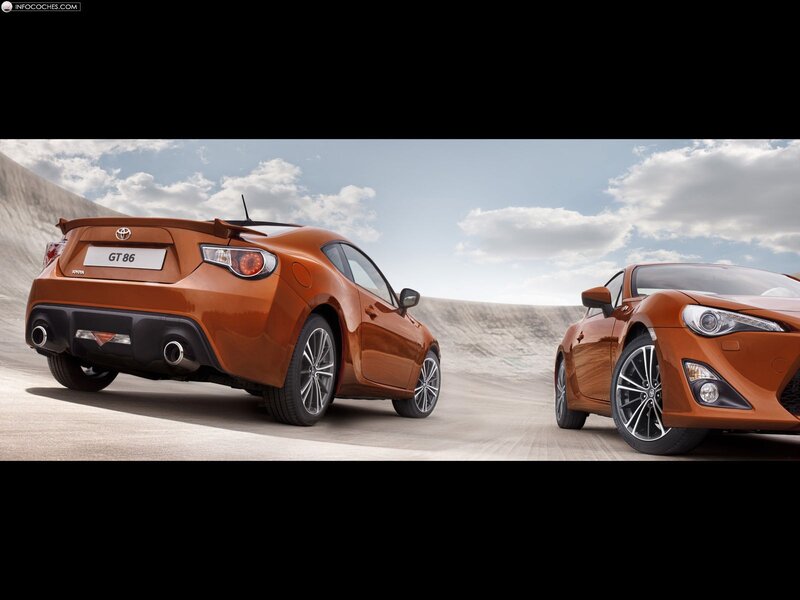 Two orange Toyota GT86 cars