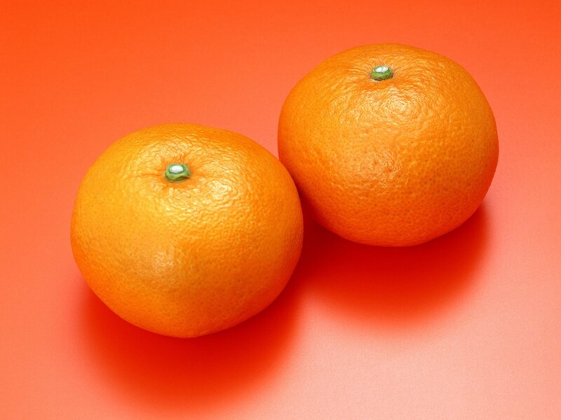 Two Oranges on Surface — Orange, Neutral, Photograph