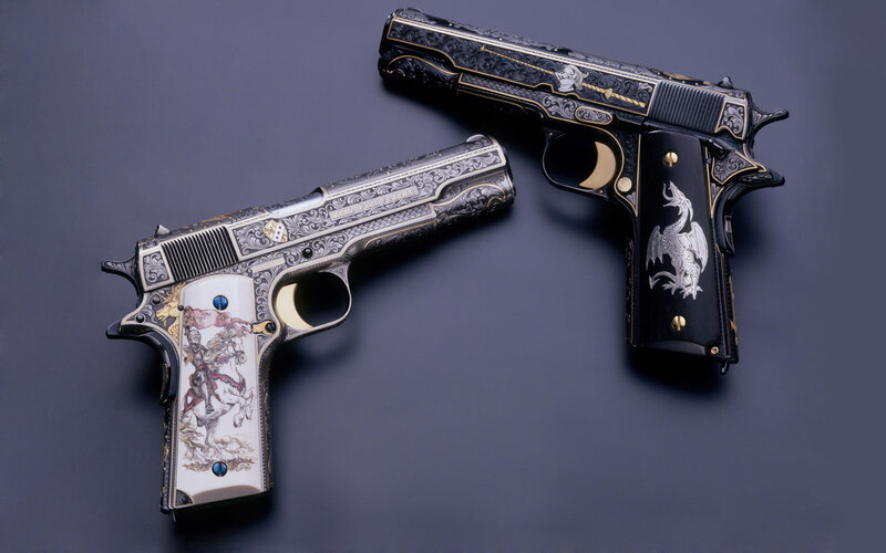 Two ornate custom pistols
