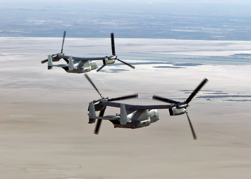 Two Osprey aircraft in flight