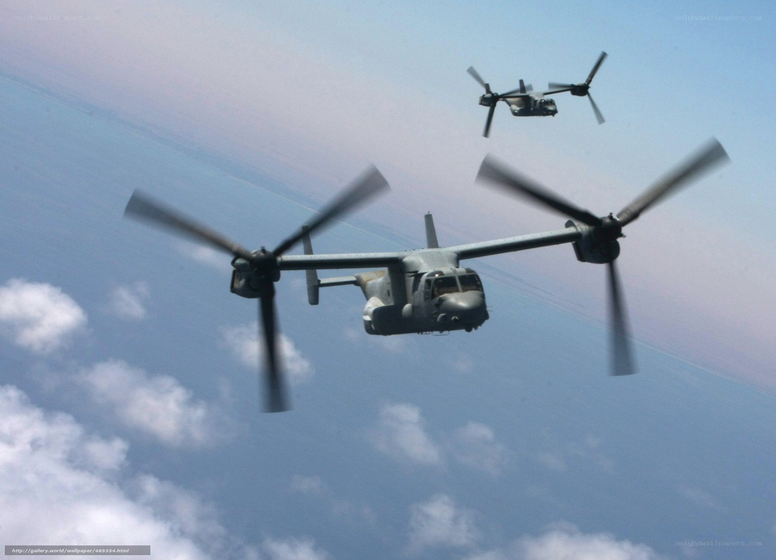 Two Osprey aircraft in flight