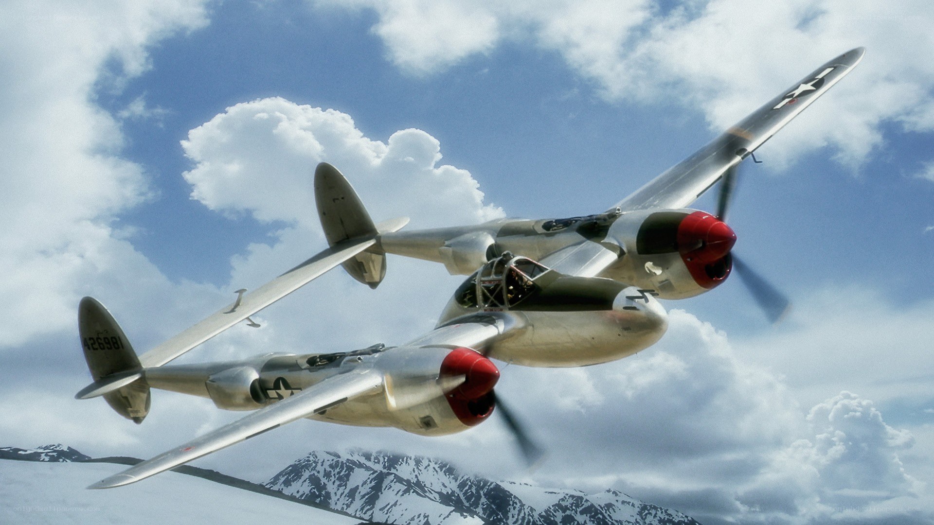 Two P-38 Lightning aircraft in flight