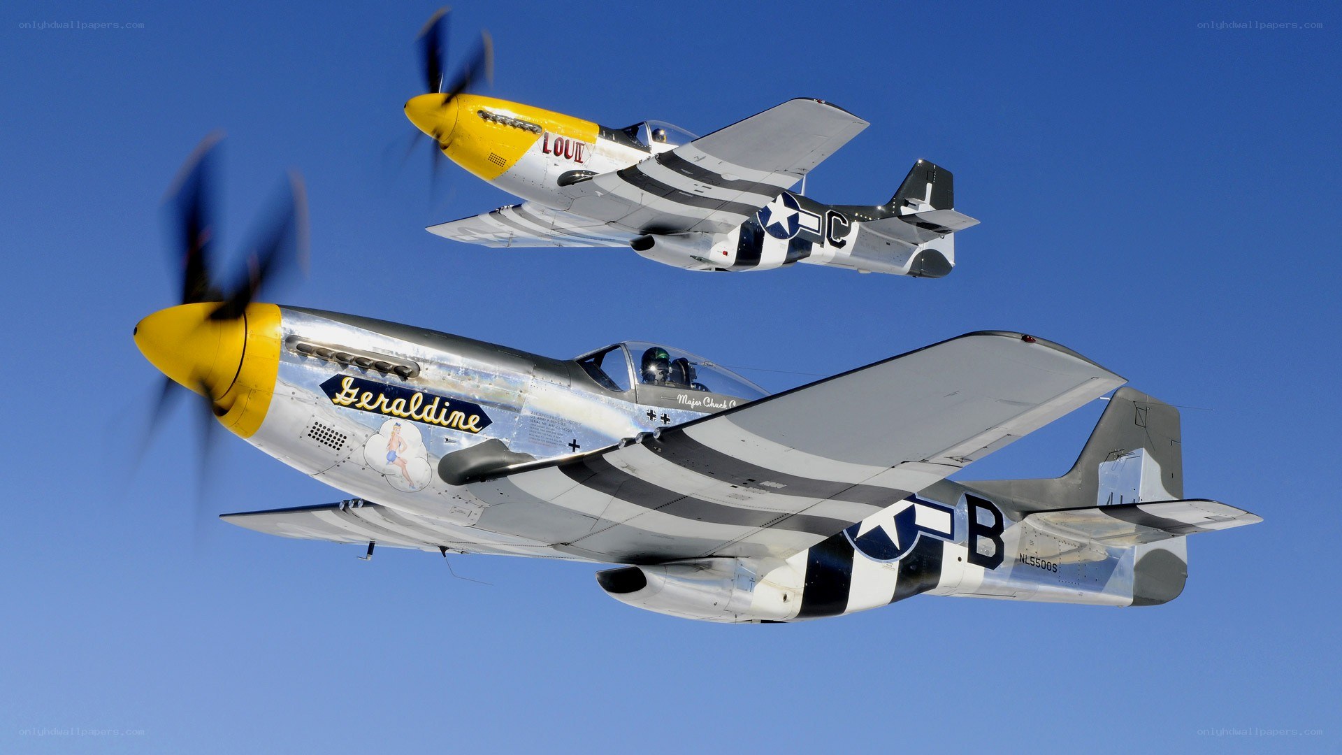 Two P-51 Mustangs in formation