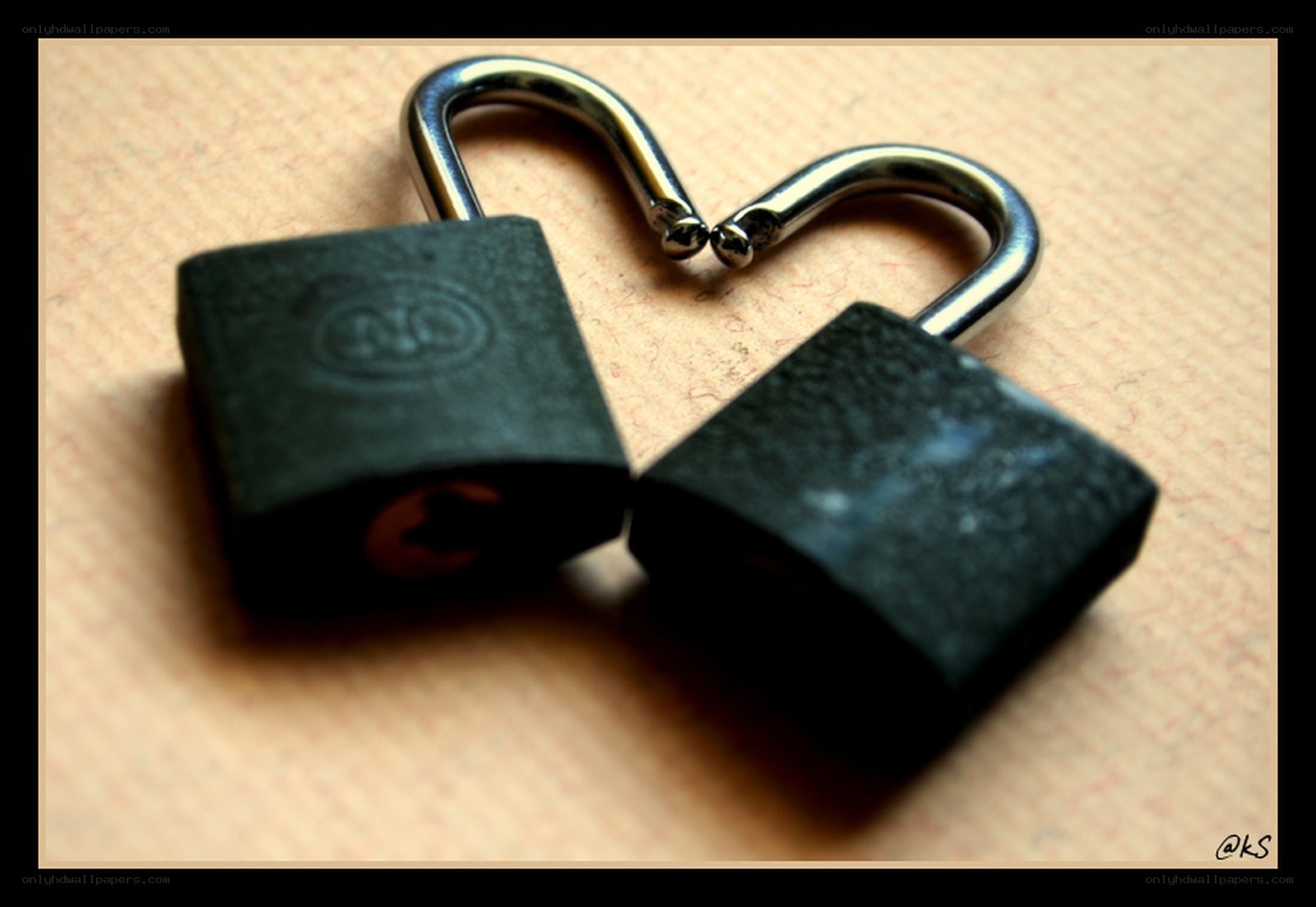 Two padlocks forming a heart