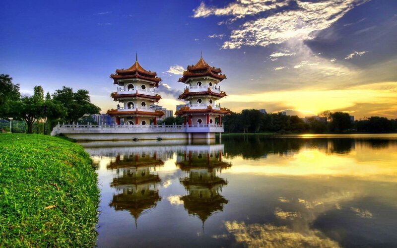 Two Pagodas on Lake — Blue, Serene, Sunset, Photograph, Trees