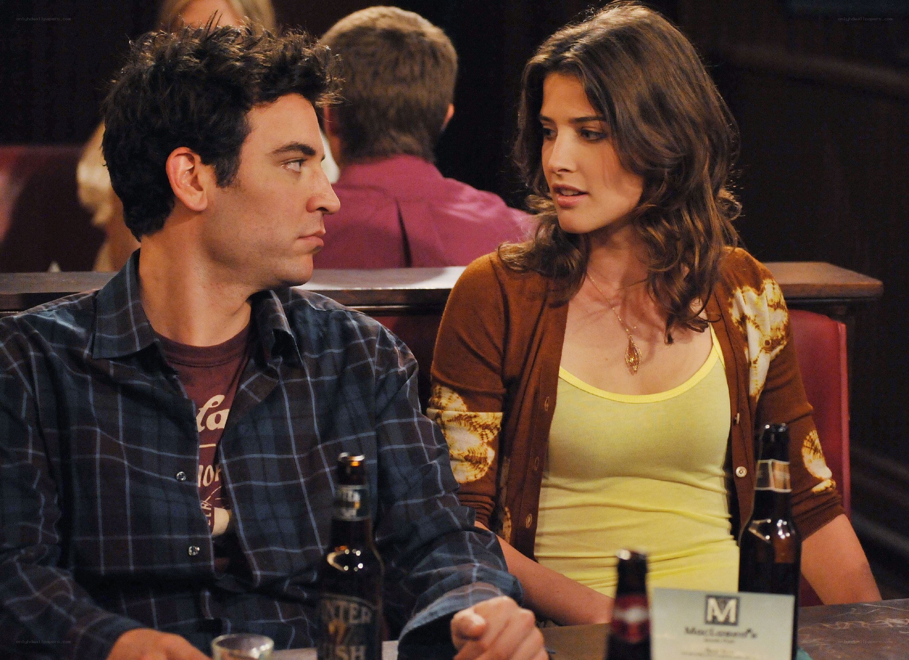 Two people at a bar