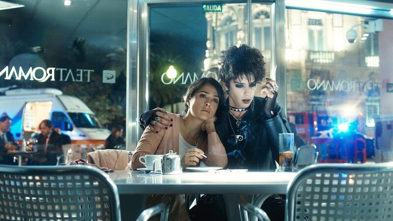 Two people at a cafe table