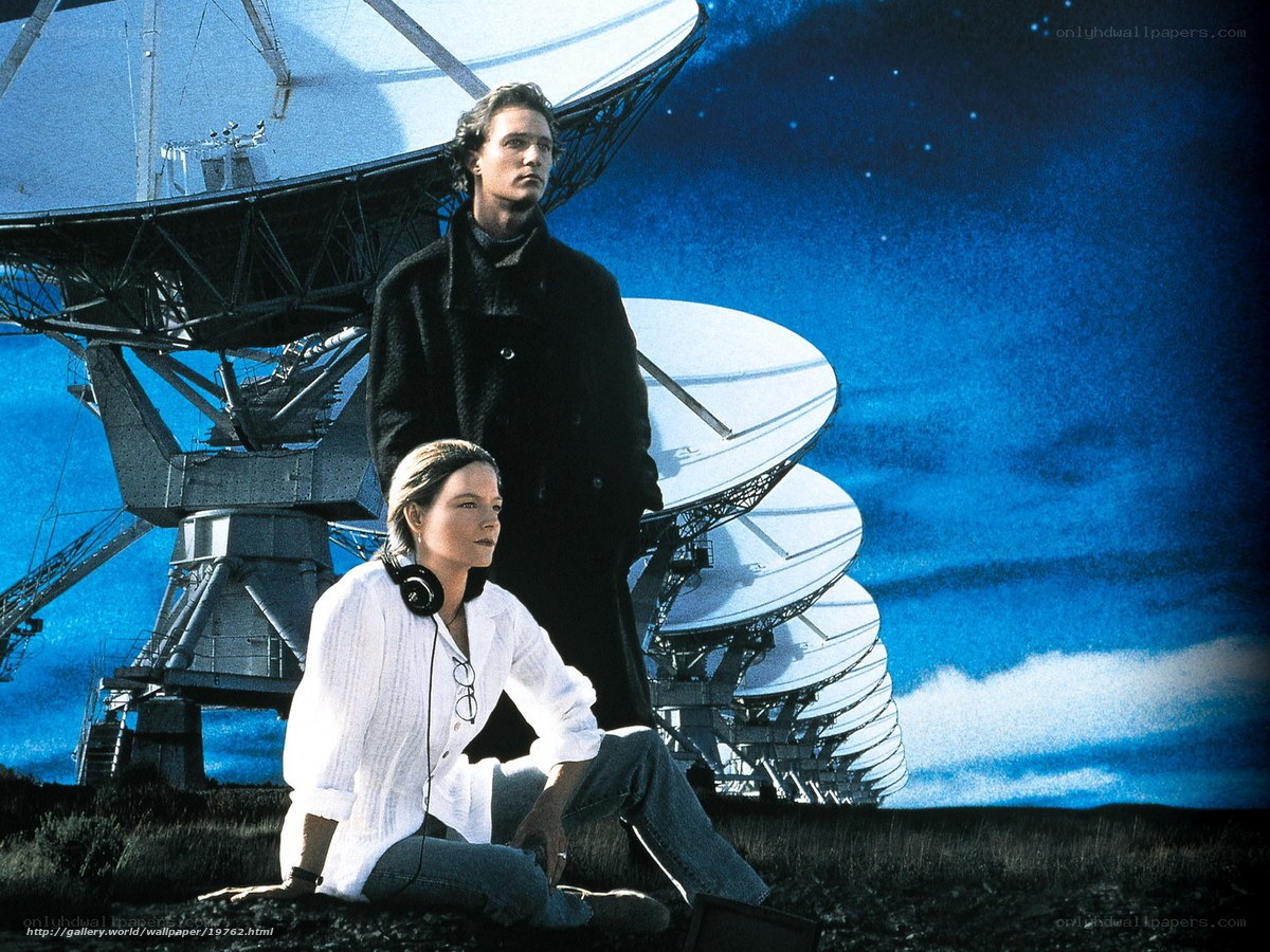 Two people at a radio telescope