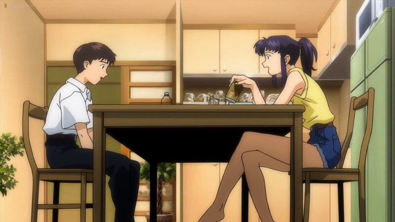 Two People at a Table — Yellow