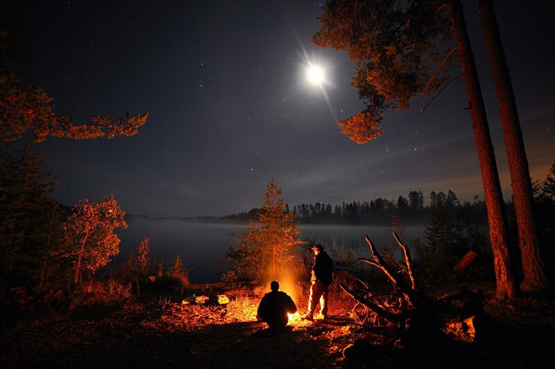 Two People at Campfire