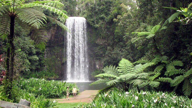 Two People at Waterfall
