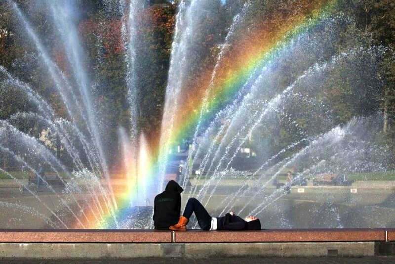 Two People by Fountain