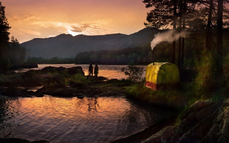 Two People Camping by River