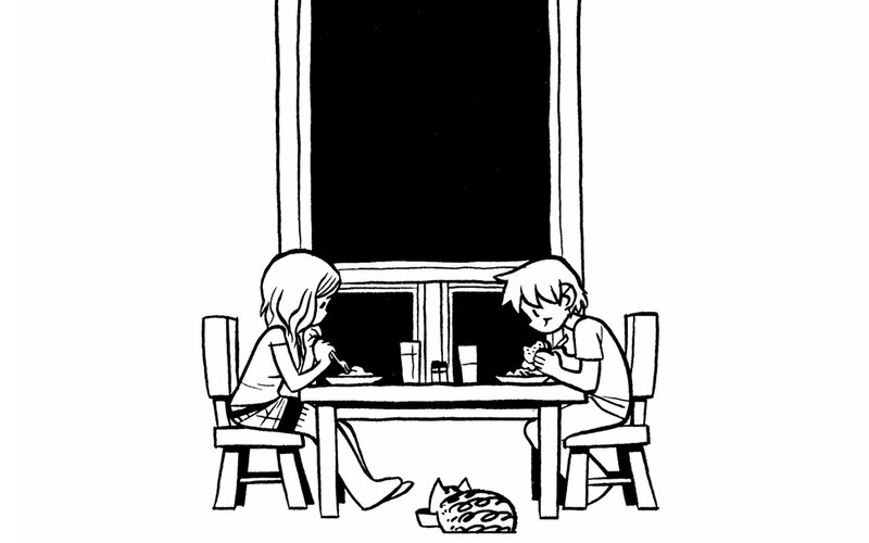 two people eating at a table