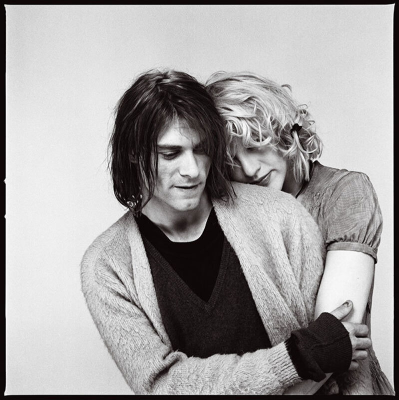 two people embracing in black and white