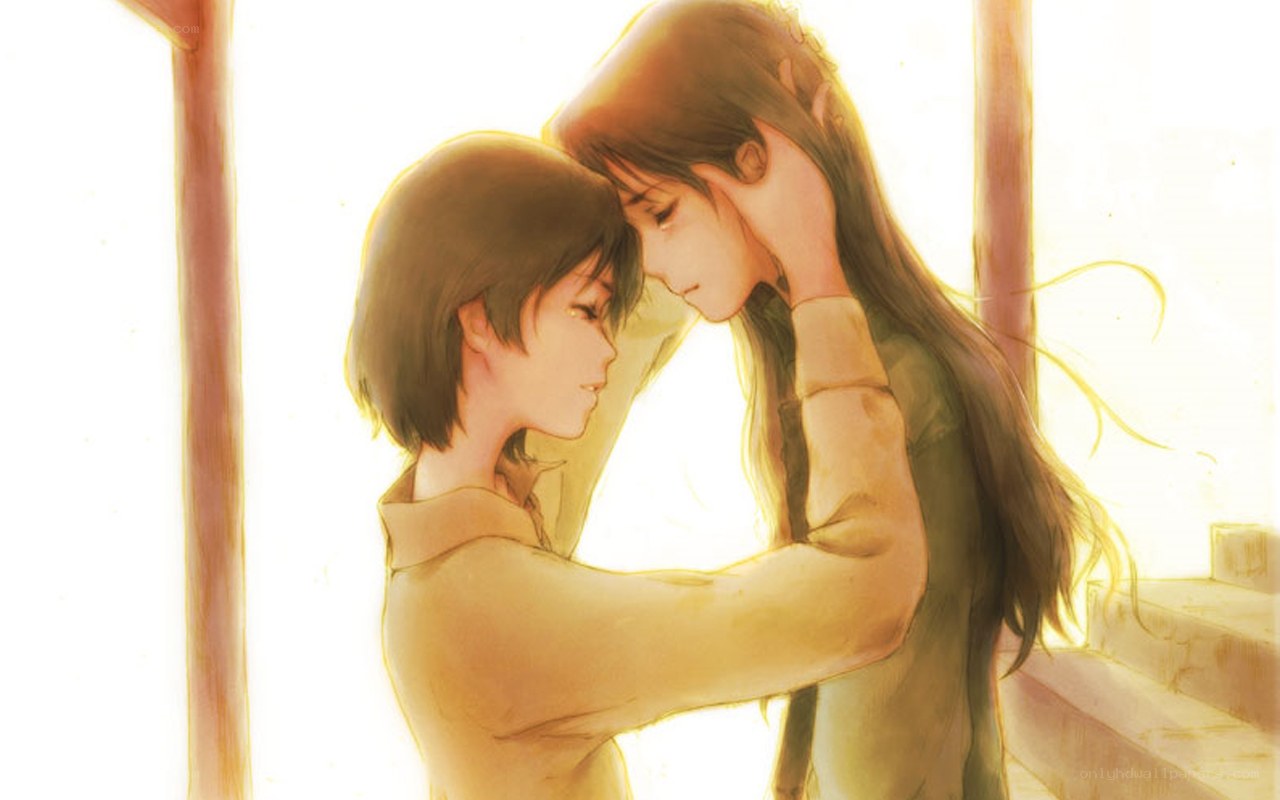 two people embracing in sunlight