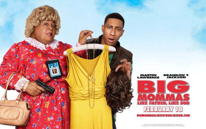 Two People Holding Clothes
