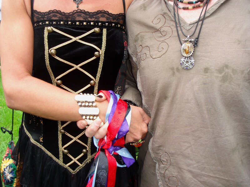 Two people holding hands