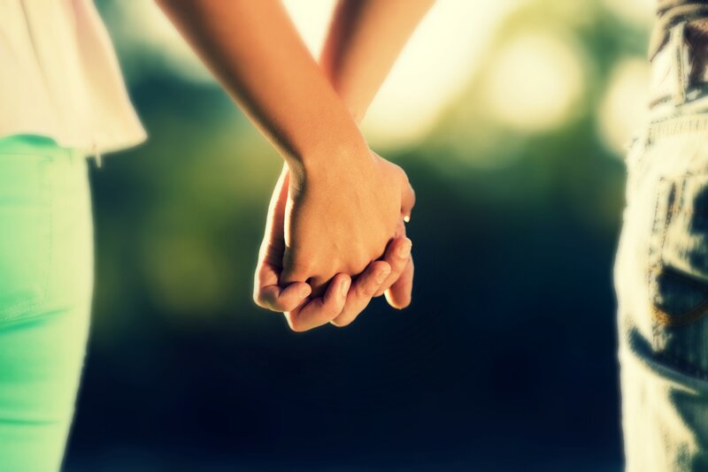 Two People Holding Hands — Green, Romantic